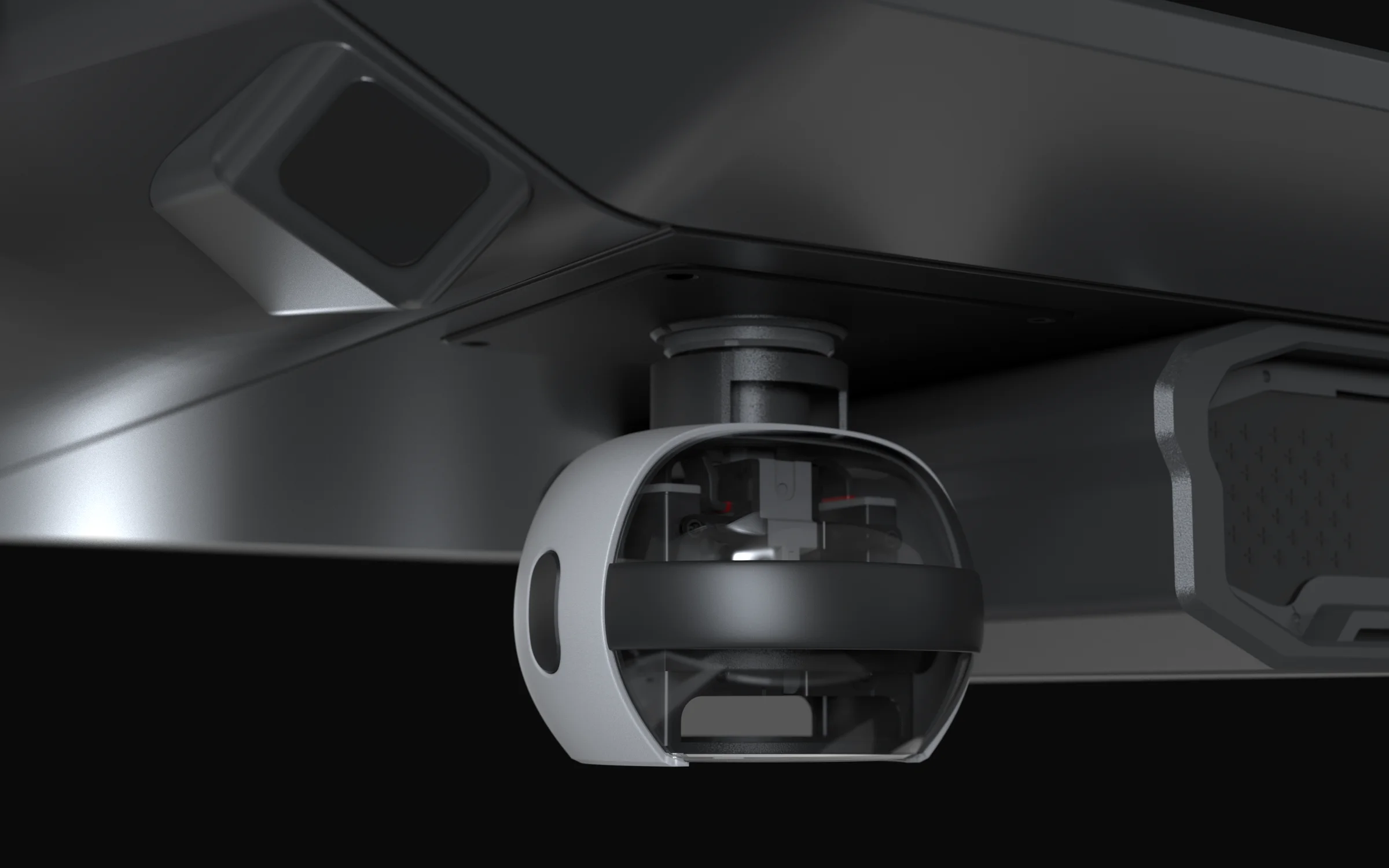 Close-up of a gimballed camera pod mounted beneath the hull
