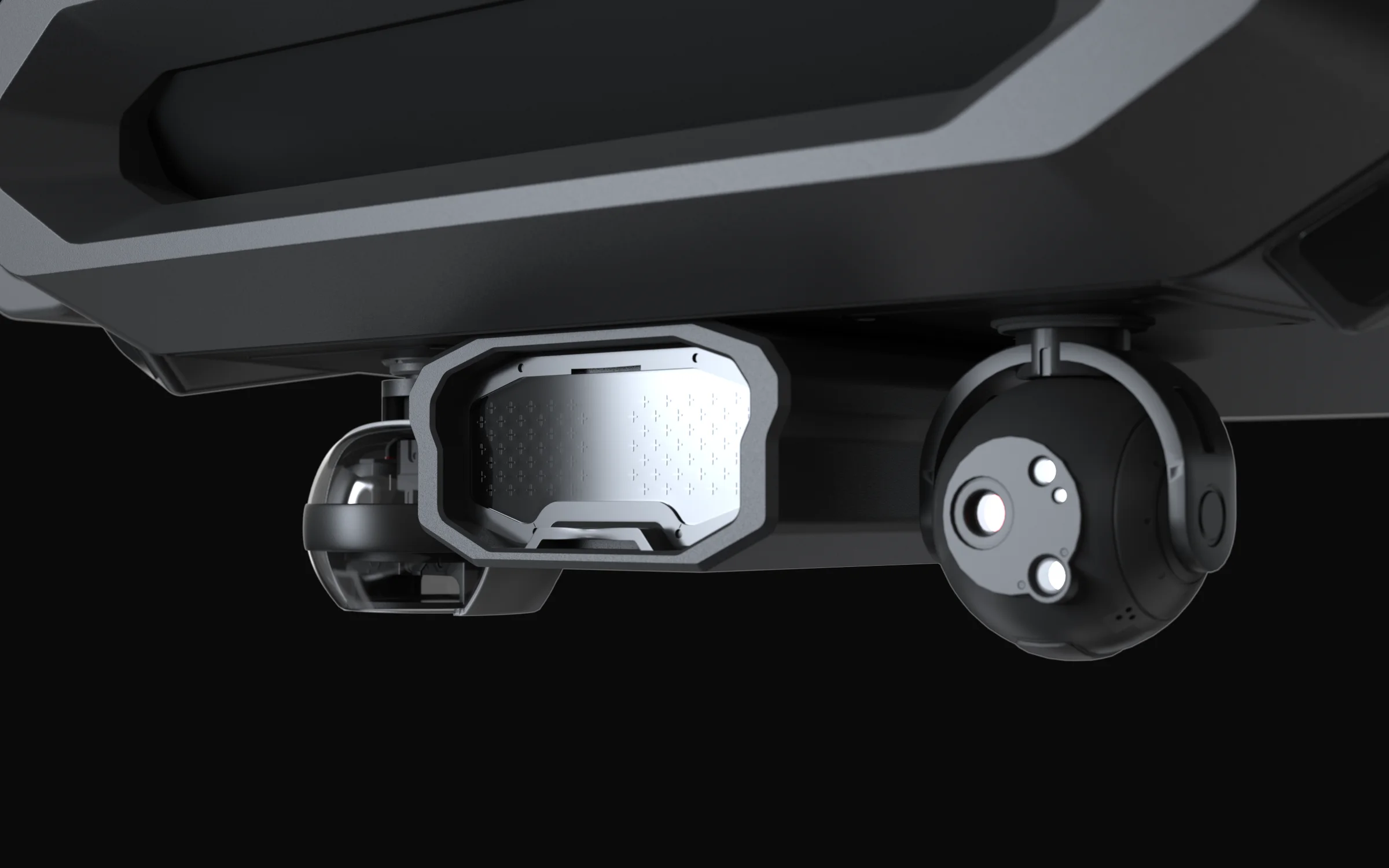 Close-up of the underside sensor bay, showing the ghost net positioning module between two camera pods