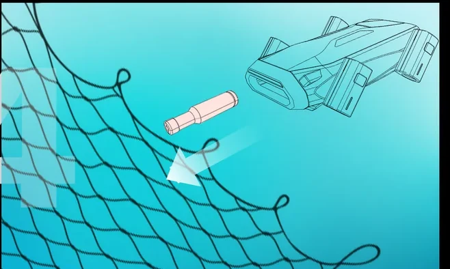 RANGER firing an inert cartridge toward an opening in the mesh
